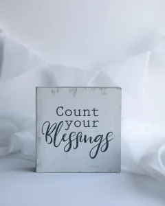 count your blessings message with outdoor tree landscape scene
